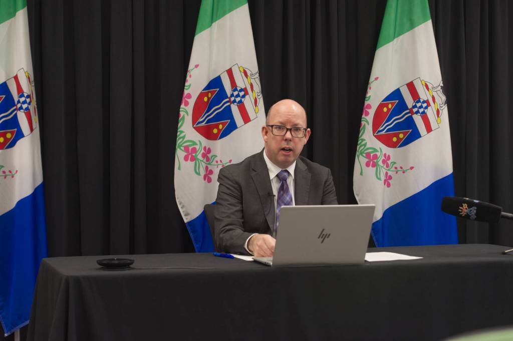 Deputy Auditor General Andrew Hayes outlines key findings from an audit of Yukon&rsquo;s child‑protection services during a news conference in Whitehorse on March 4. (Jake Howarth/Yukon News)