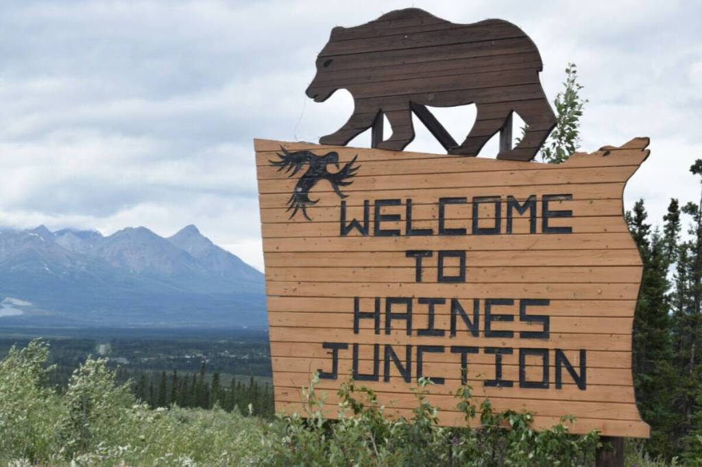 The Welcome to Haines Junction sign looks over the village on July 13, 2024.